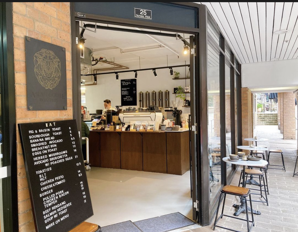 ASLAN Coffee The Rocks storefront at 25 Nurses Walk with outdoor tables
